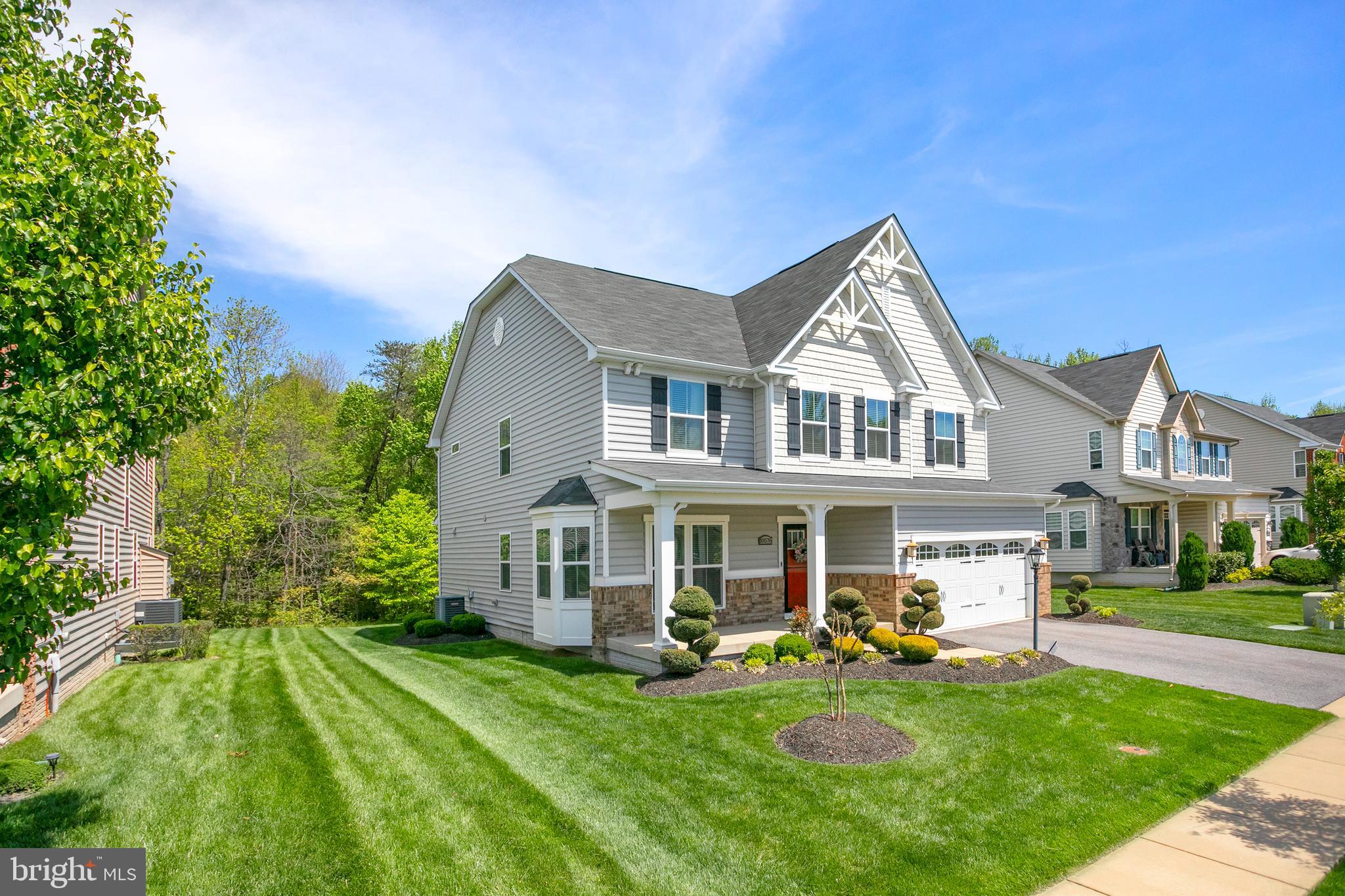 10576 Long Leaf Lane Waldorf, MD 20603 - Photo 40 of 54 a view of a house with a yard patio and fire pit