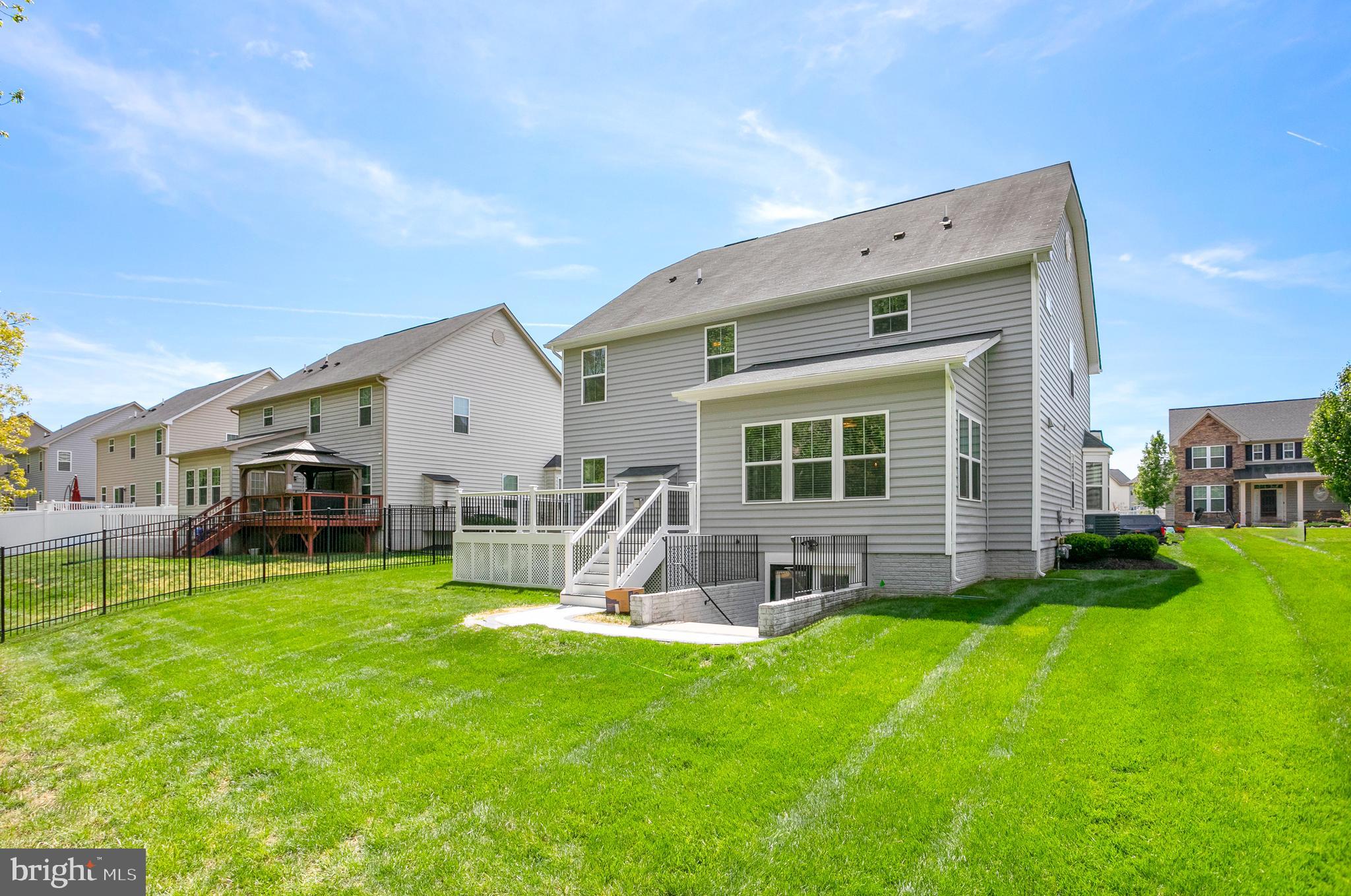 10576 Long Leaf Lane Waldorf, MD 20603 - Photo 43 of 54 a view of a house with a yard and sitting area