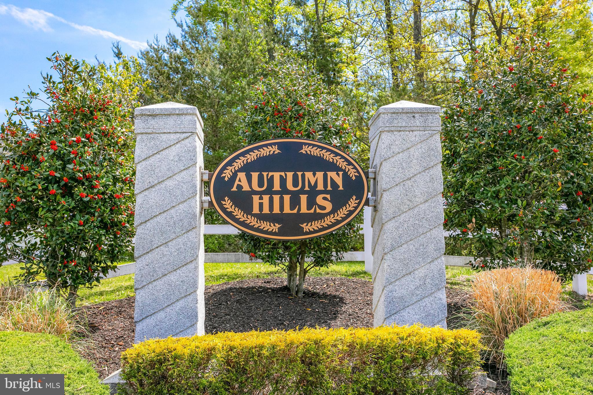 10576 Long Leaf Lane Waldorf, MD 20603 - Photo 47 of 54 a sign board with a small yard and wooden fence