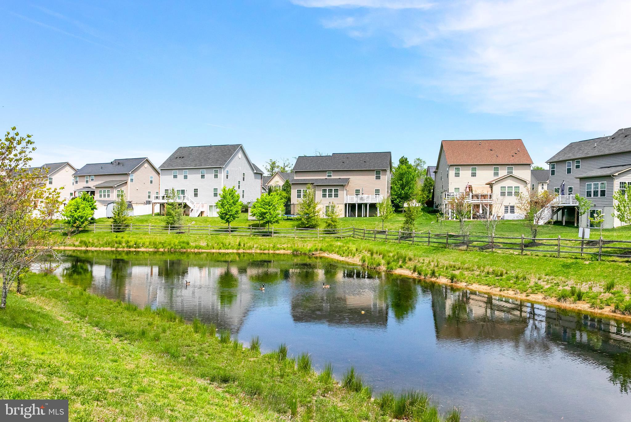 10576 Long Leaf Lane Waldorf, MD 20603 - Photo 48 of 54 a view of residential houses with outdoor space and lake view
