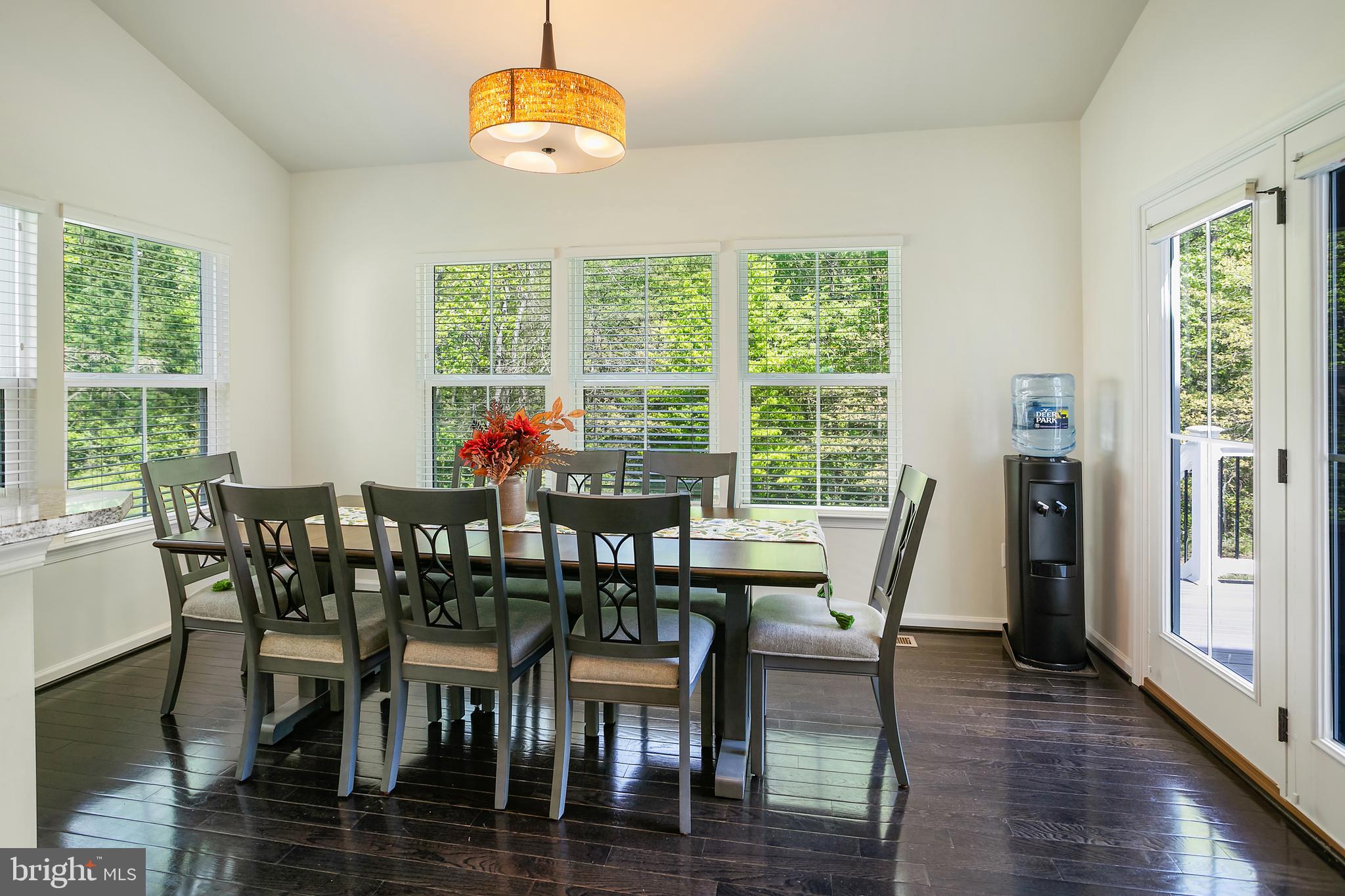 10576 Long Leaf Lane Waldorf, MD 20603 - Photo 6 of 54 a view of a dining room with furniture window and wooden floor