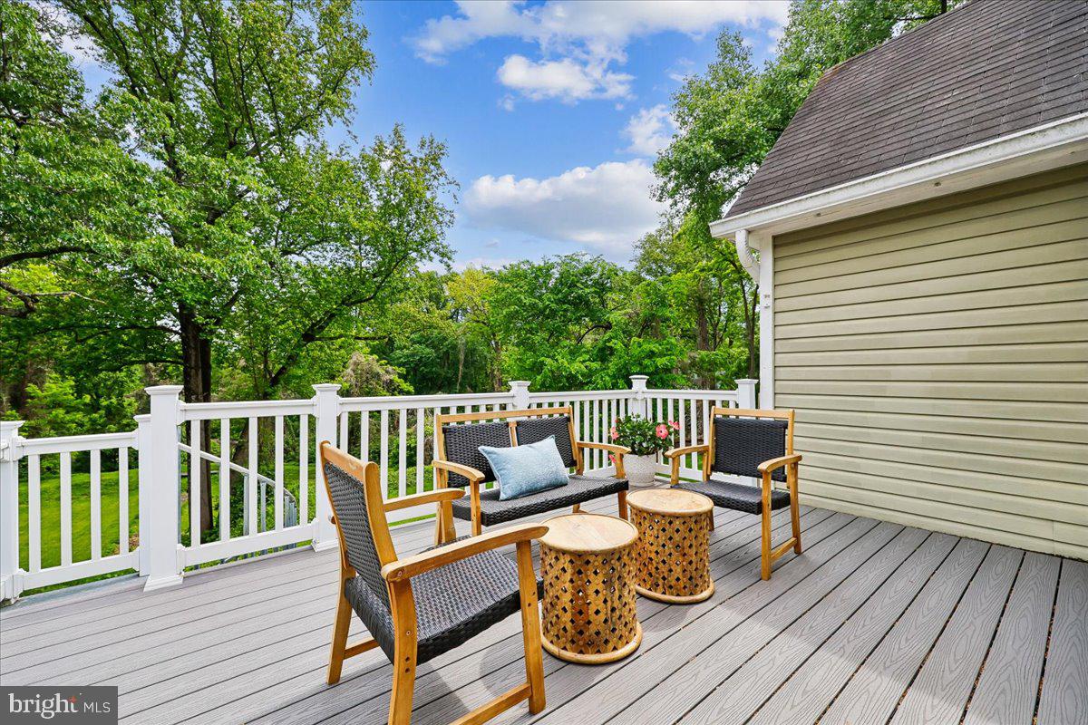 10029 Pratt Place Silver Spring, MD 20910 - Photo 17 of 36 a view of balcony with furniture and wooden deck