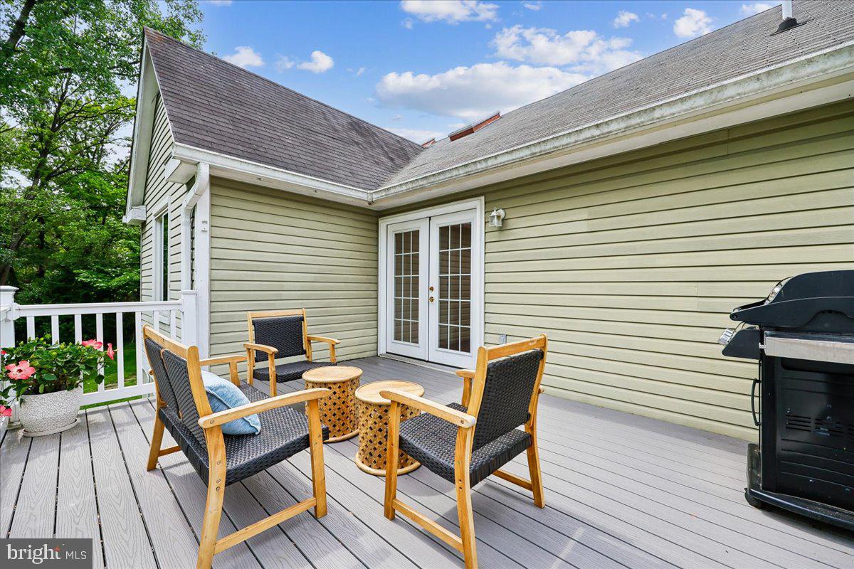 10029 Pratt Place Silver Spring, MD 20910 - Photo 19 of 36 a patio with table and chairs and potted plants