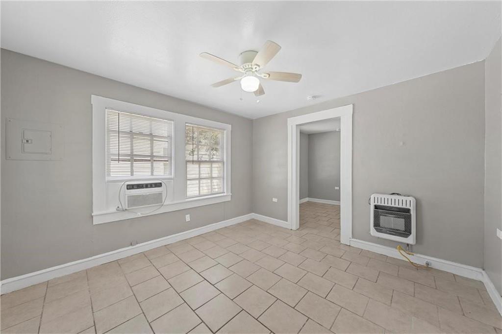 1121 Ashleman Street Waco, TX 76705 - Photo 3 of 11 a view of an empty room with a window