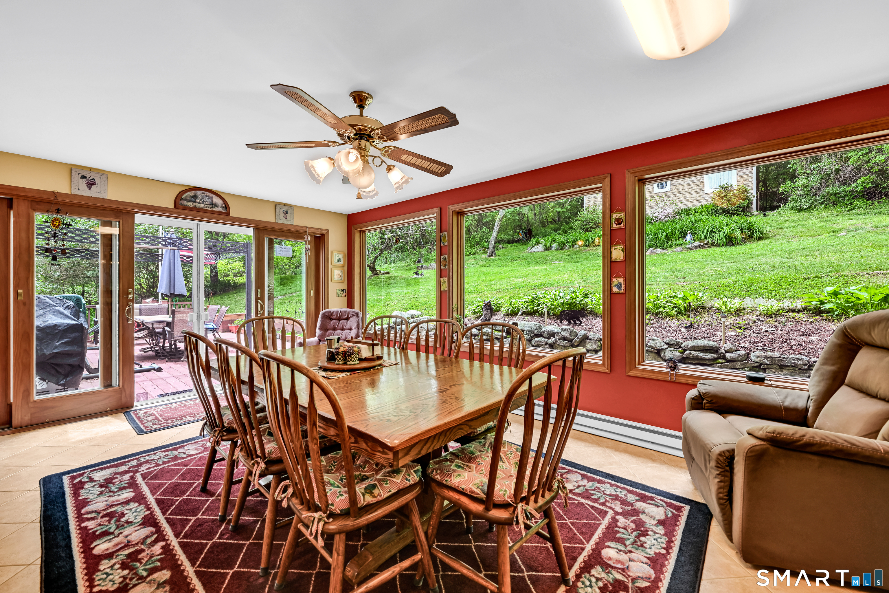 155 Lake Harwinton Road Harwinton, CT 06791 - Photo 5 of 39 a view of a dining room with furniture window and outside view