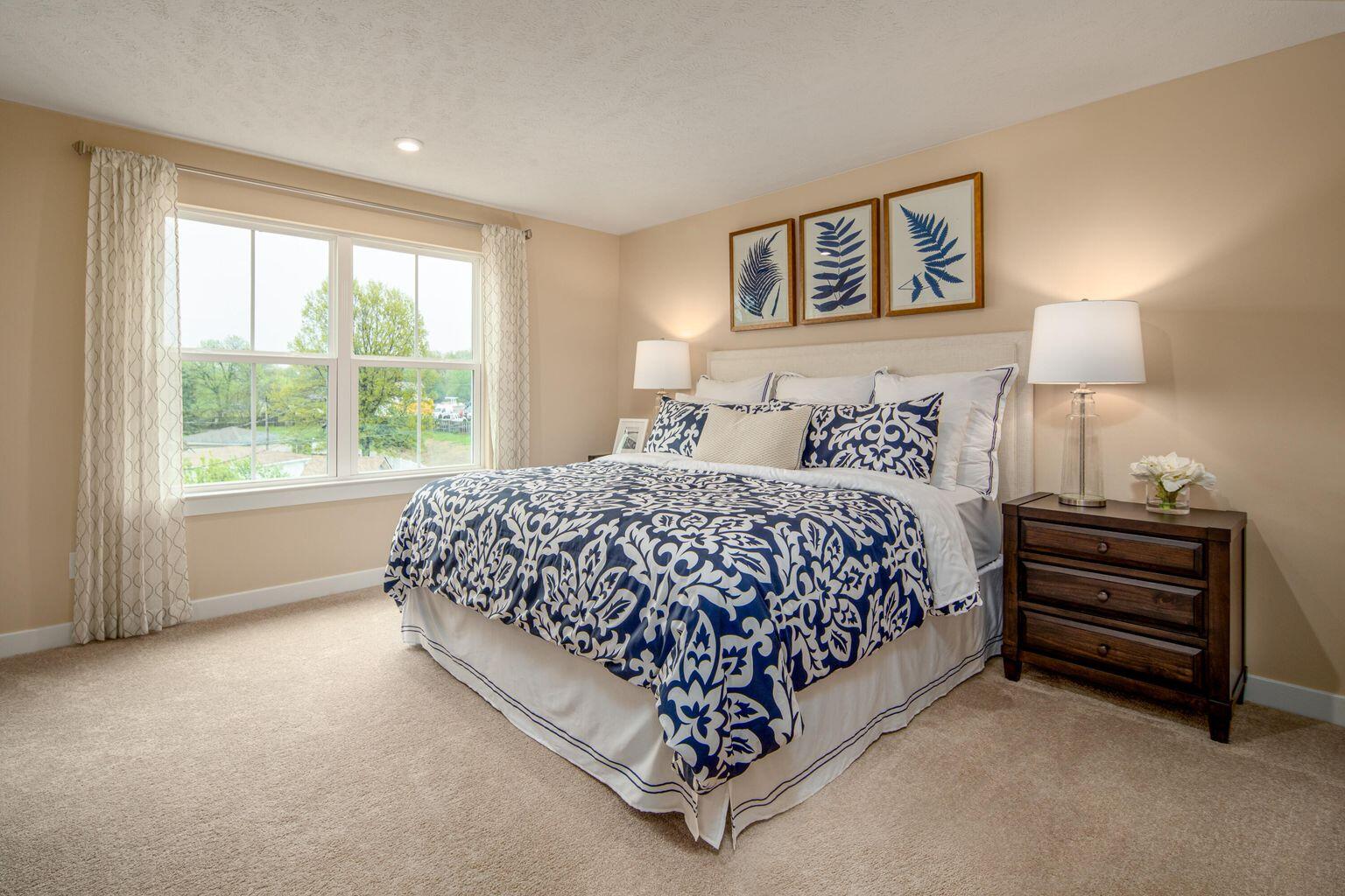 7197 Fairway Rdg Circle Salem, VA 24153 - Photo 6 of 9 a bed sitting in a bedroom next to a window