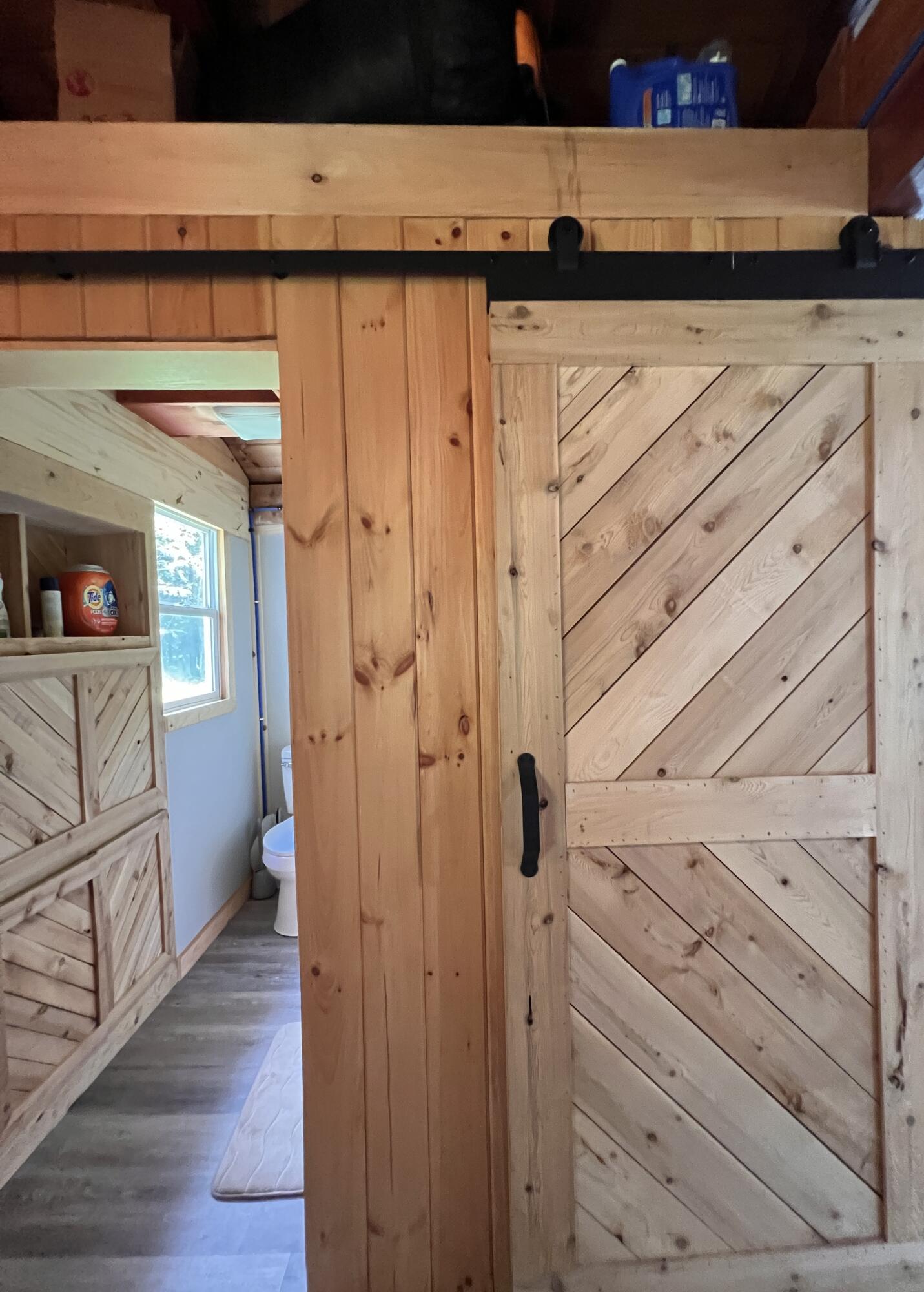 540 Tate Road Corinth, ME 04427 - Photo 18 of 33 Barndoor to Bathroom