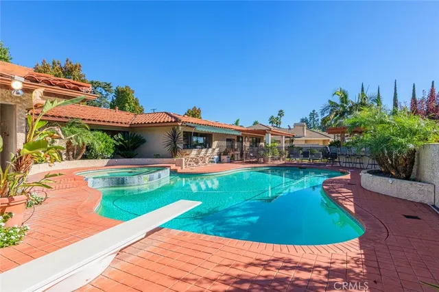a view of a house with a swimming pool