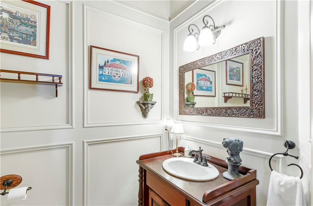 154 Gold Leaf Trail Powder Springs, GA 30127 - Photo 13 of 61 a bathroom with a sink and a mirror