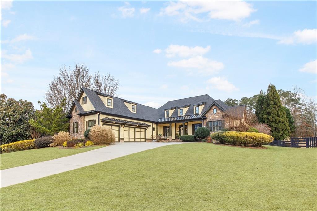 154 Gold Leaf Trail Powder Springs, GA 30127 - Photo 3 of 61 a front view of a house with a yard
