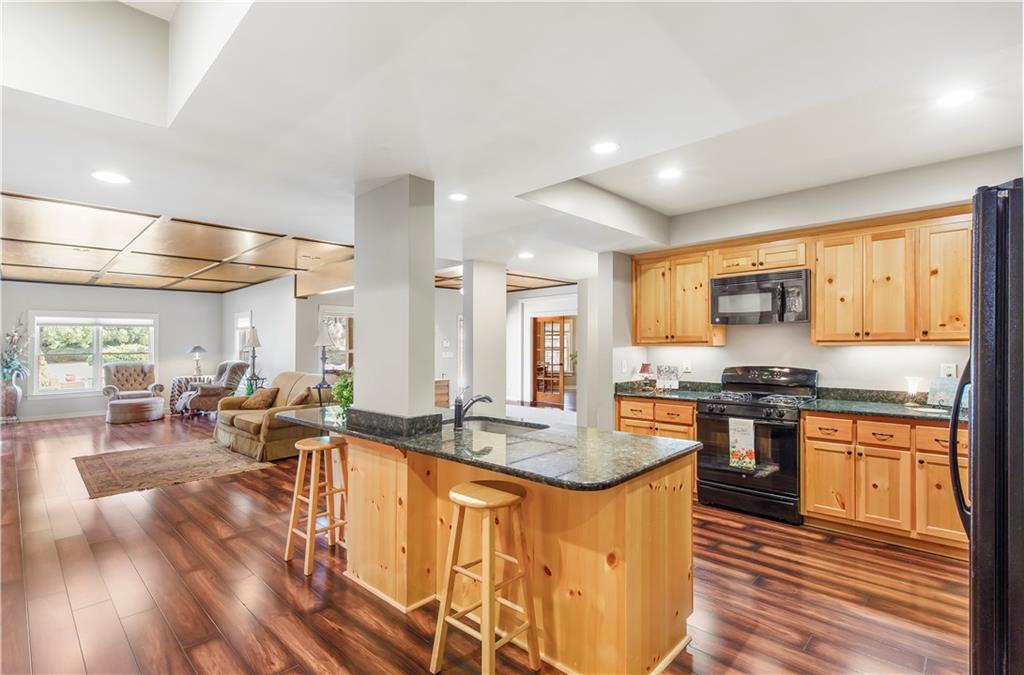 154 Gold Leaf Trail Powder Springs, GA 30127 - Photo 41 of 61 a large kitchen with lots of counter space
