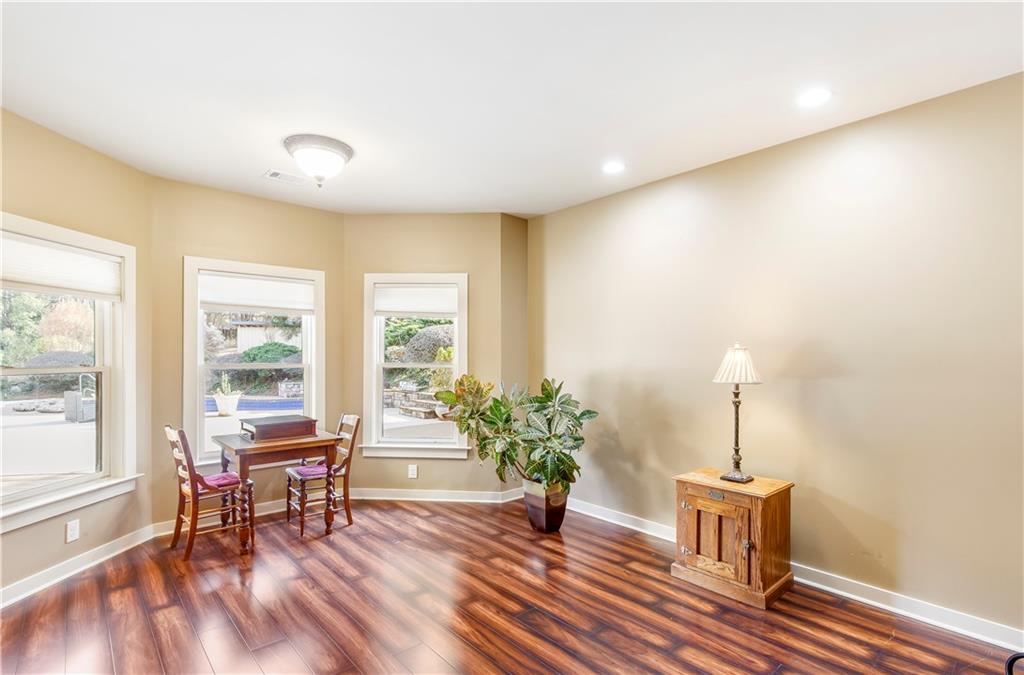 154 Gold Leaf Trail Powder Springs, GA 30127 - Photo 45 of 61 a living room with furniture and a potted plant
