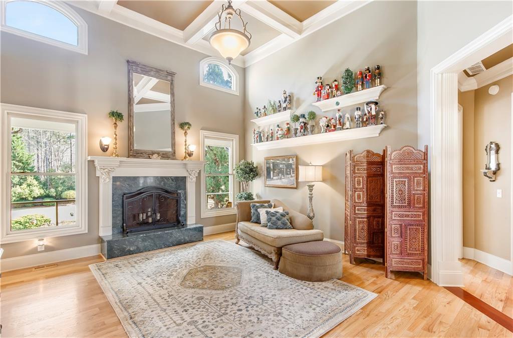 154 Gold Leaf Trail Powder Springs, GA 30127 - Photo 7 of 61 a living room with furniture and a fireplace