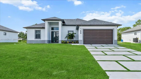 $344,999 | 766 Roma Avenue South, Lehigh Acres, FL 33974