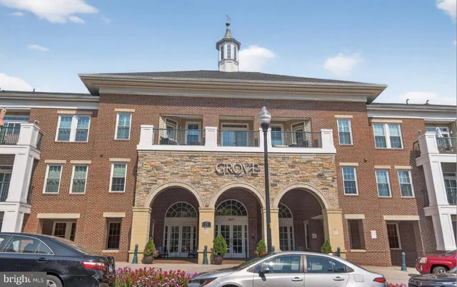 a front view of a building with windows