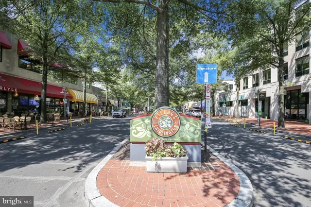 a view of a building with sitting area