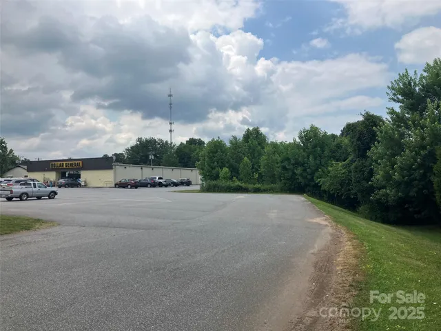 a cars parked in the middle of a field