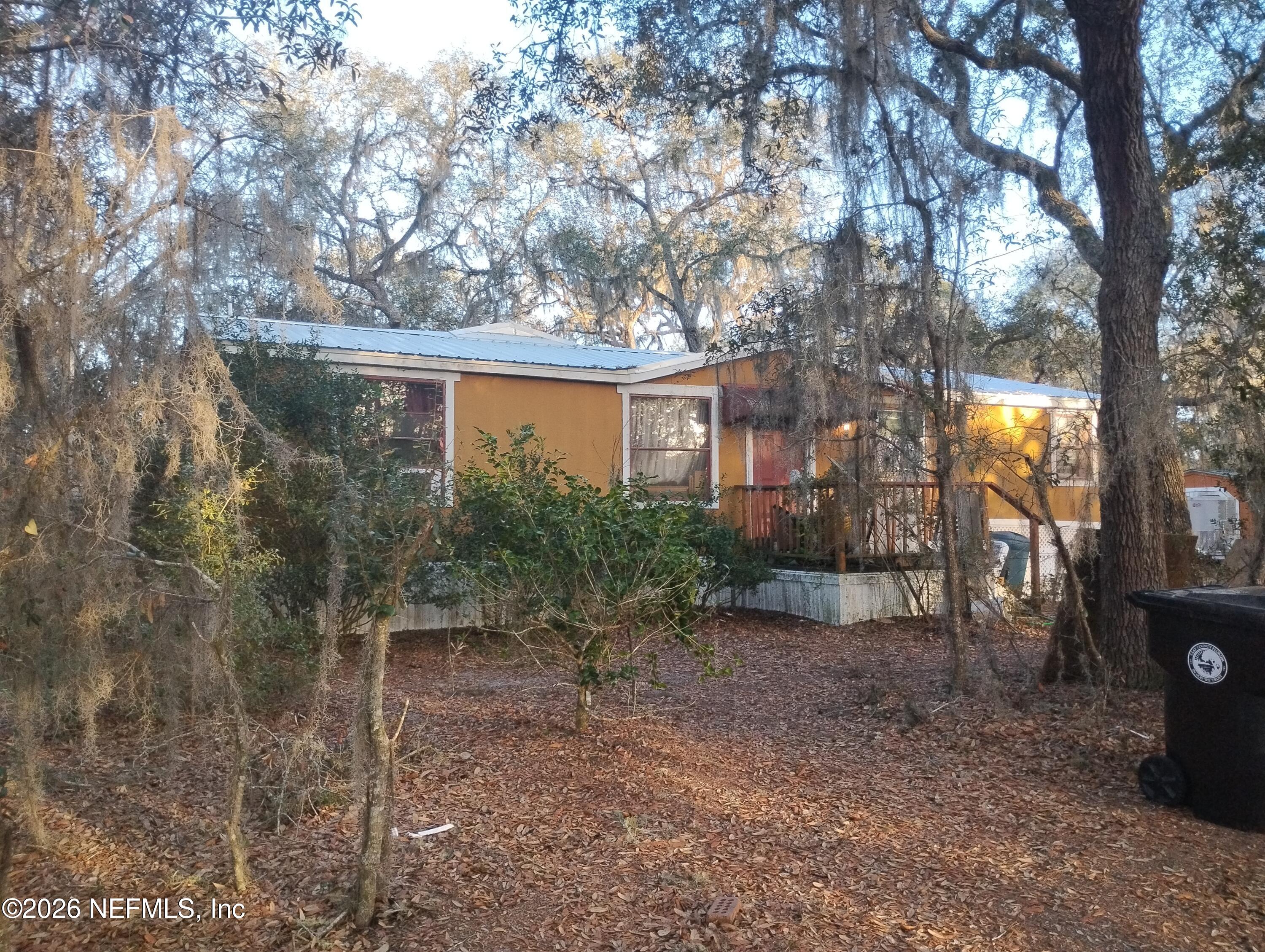 5816 Bryce Street Keystone Heights, FL 32656 - Photo 1 of 5 a view of a house with a yard