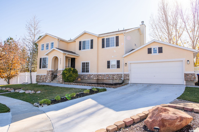 8402 Ranchwood Court West Jordan, UT 84081 - Photo 1 of 1 View of front of house with a garage