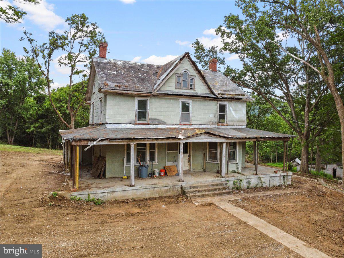 3305 Gapland Road Rohrersville, MD 21779 - Photo 2 of 27 a front view of a house with a garden