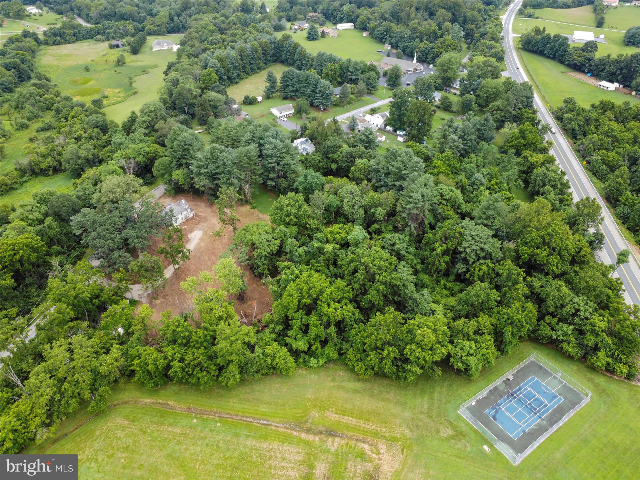 3305 Gapland Road Rohrersville, MD 21779 - Photo 22 of 27 a view of a lake with a house