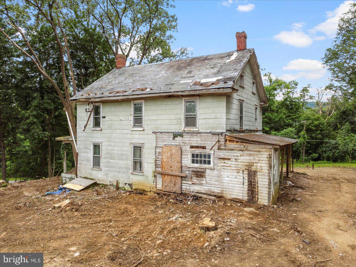 3305 Gapland Road Rohrersville, MD 21779 - Photo 3 of 27 a front view of a house with a yard