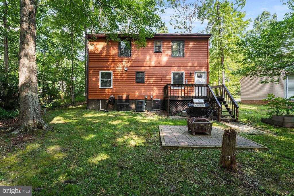 127 Saylers Creek Road Locust Grove, VA 22508 - Photo 13 of 56 a view of a house with backyard
