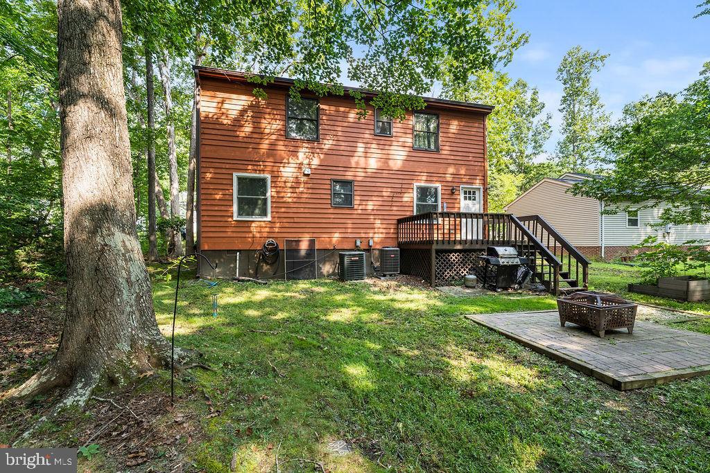 127 Saylers Creek Road Locust Grove, VA 22508 - Photo 14 of 56 a view of a house with backyard and garden