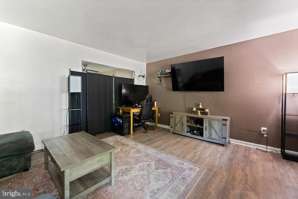 127 Saylers Creek Road Locust Grove, VA 22508 - Photo 25 of 56 a living room with furniture and a flat screen tv