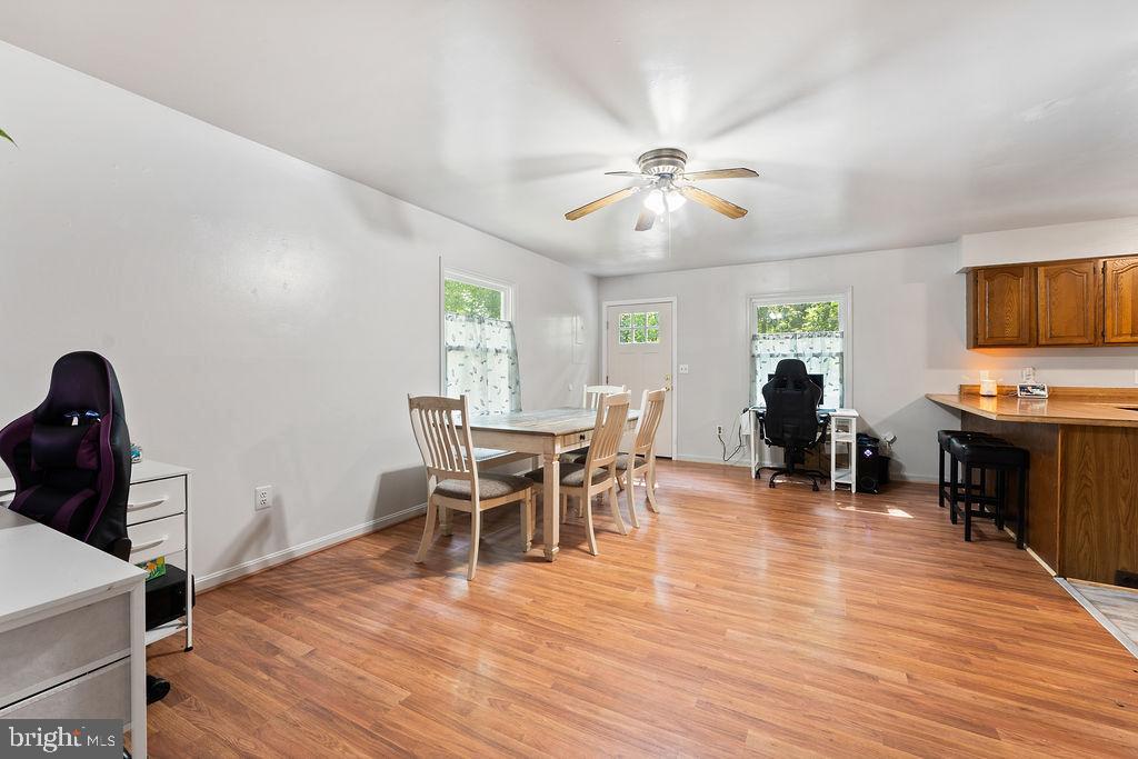 127 Saylers Creek Road Locust Grove, VA 22508 - Photo 30 of 56 a view of a dining room with furniture and a window