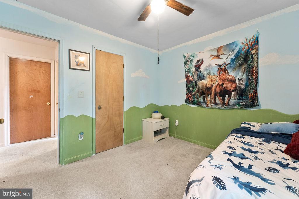 127 Saylers Creek Road Locust Grove, VA 22508 - Photo 46 of 56 a bedroom with natural light and a bed