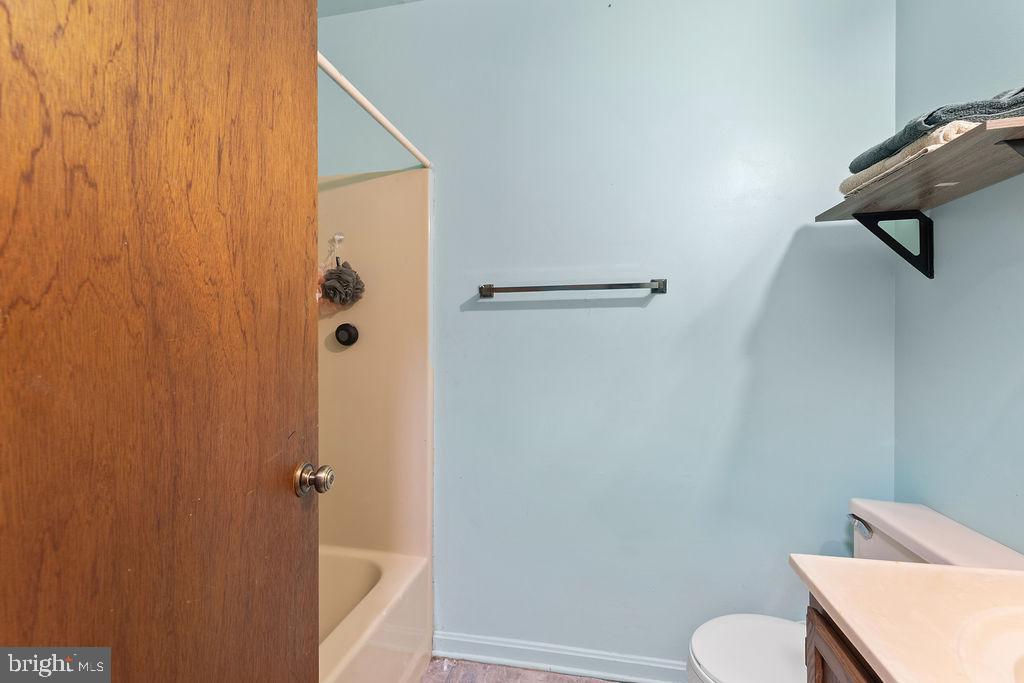 127 Saylers Creek Road Locust Grove, VA 22508 - Photo 48 of 56 a bathroom with a shower and toilet