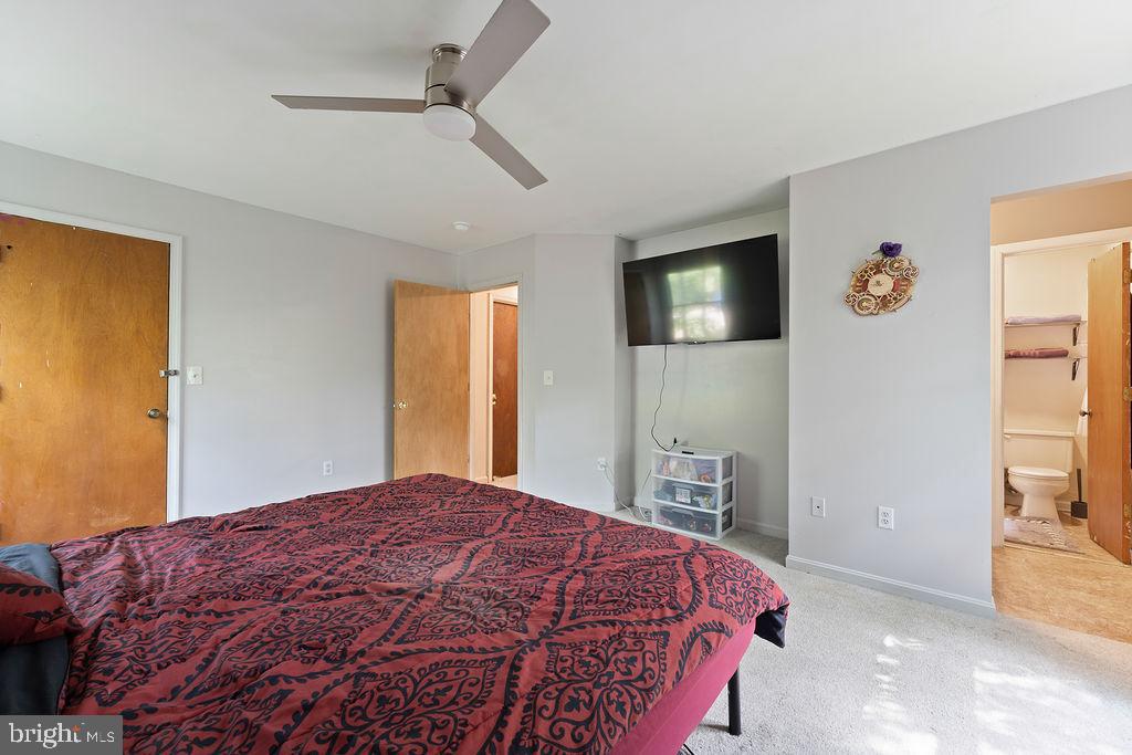 127 Saylers Creek Road Locust Grove, VA 22508 - Photo 50 of 56 a bedroom with a bed and a television