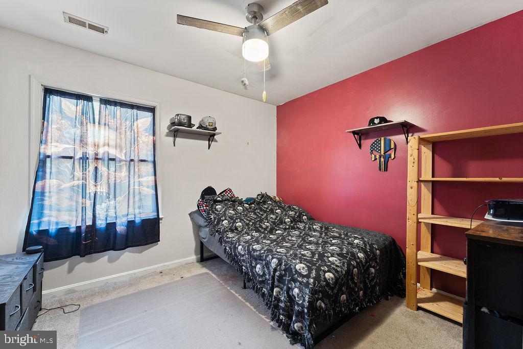 127 Saylers Creek Road Locust Grove, VA 22508 - Photo 53 of 56 a bed room with a bed and a window