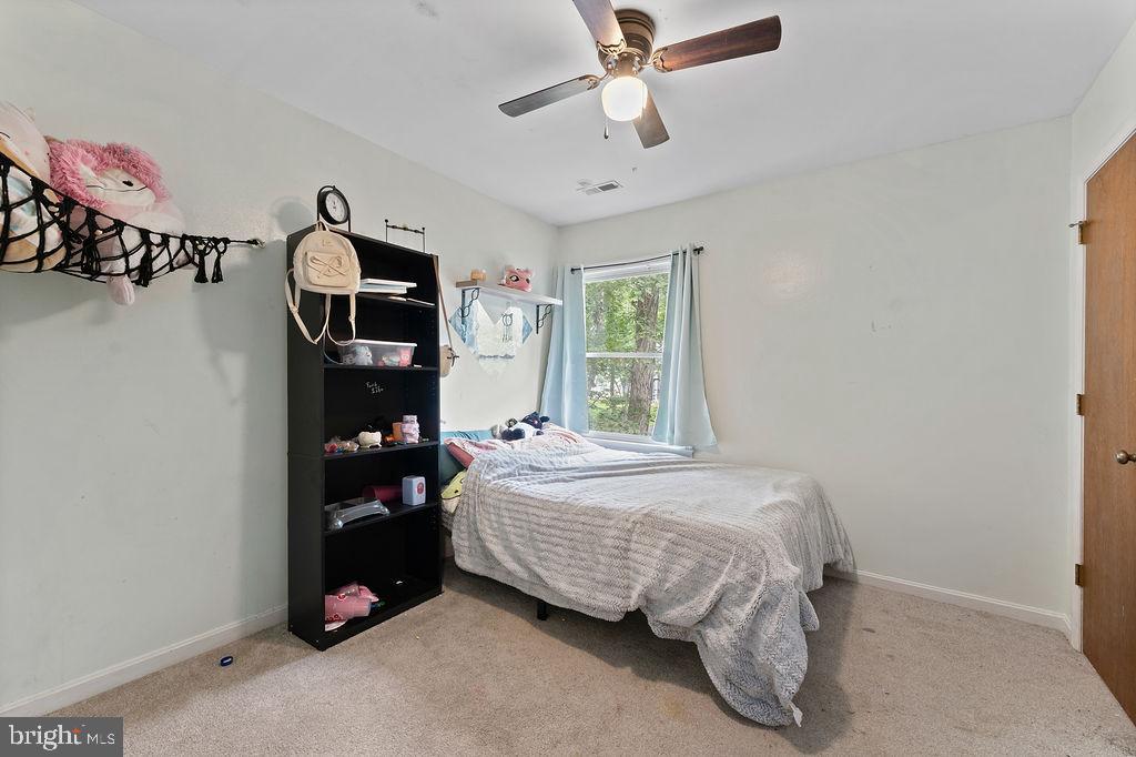 127 Saylers Creek Road Locust Grove, VA 22508 - Photo 55 of 56 a bedroom with a bed and a window