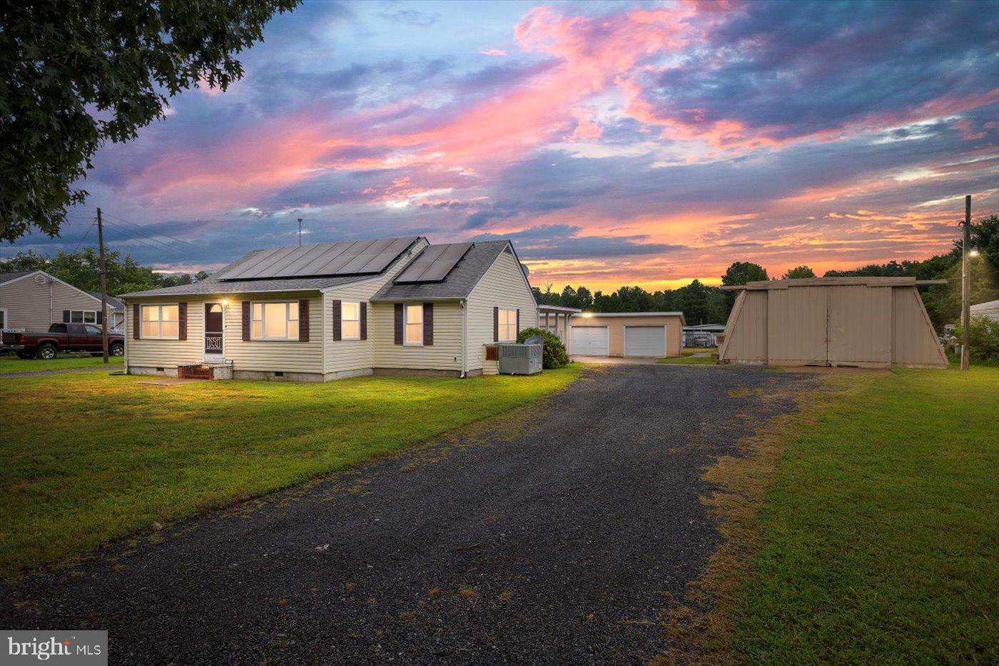 a view of house with garden