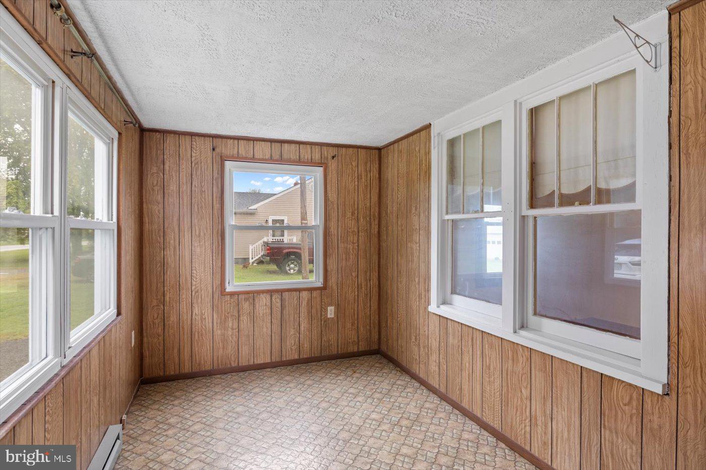 110 Longfield Road Colonial Beach, VA 22443 - Photo 12 of 40 a view of an empty room with windows