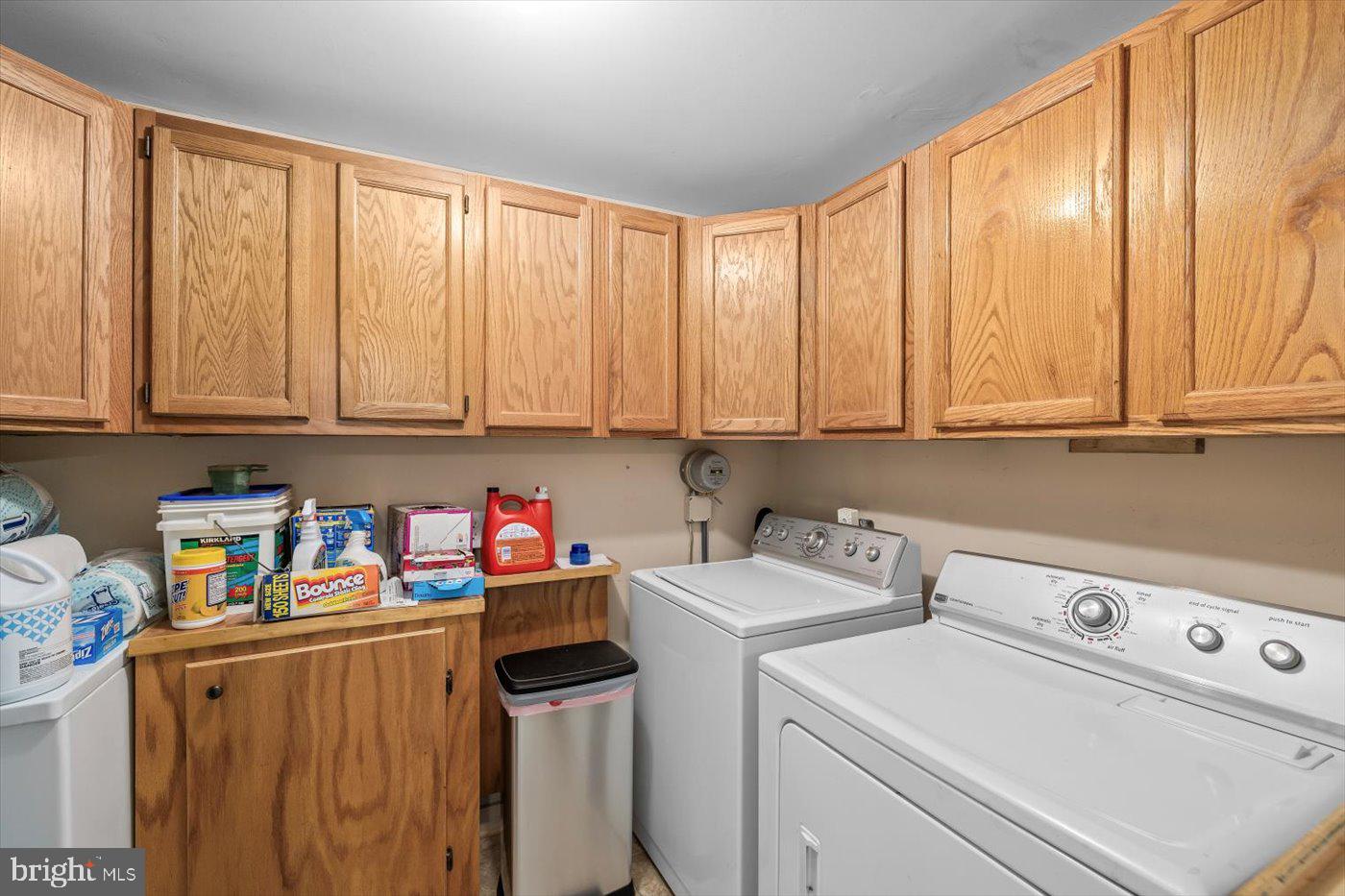110 Longfield Road Colonial Beach, VA 22443 - Photo 18 of 40 a utility room with dryer washer and a fridge