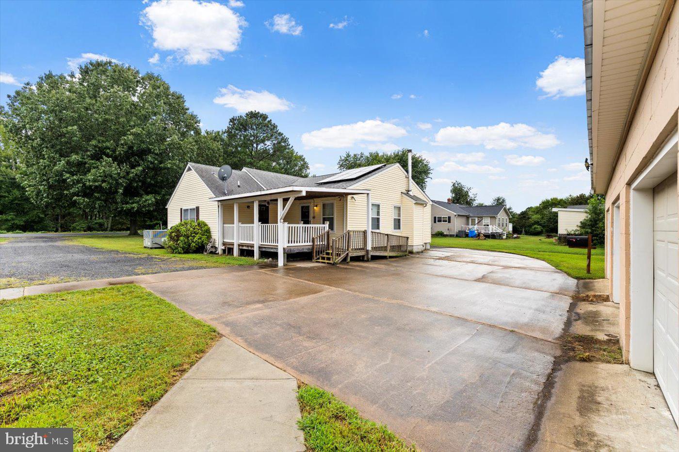 110 Longfield Road Colonial Beach, VA 22443 - Photo 2 of 40 a view of house with swimming pool outdoor seating and entertaining space