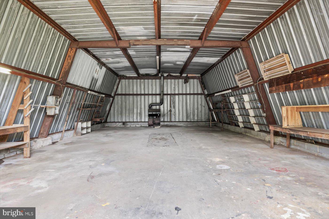 110 Longfield Road Colonial Beach, VA 22443 - Photo 35 of 40 a view of an empty room with a staircase