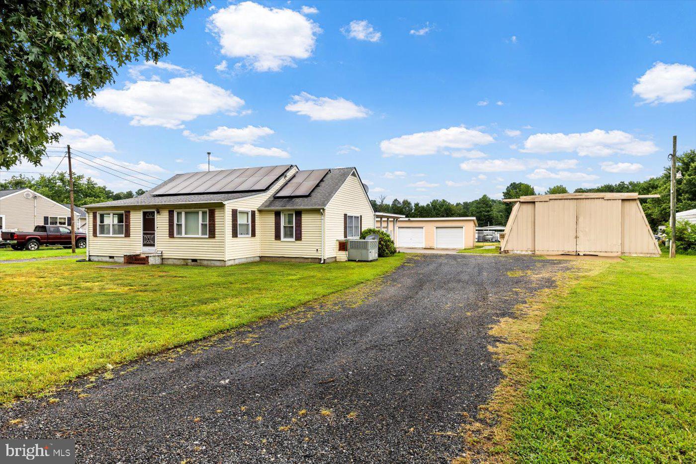 110 Longfield Road Colonial Beach, VA 22443 - Photo 4 of 40 a view of a house with a yard