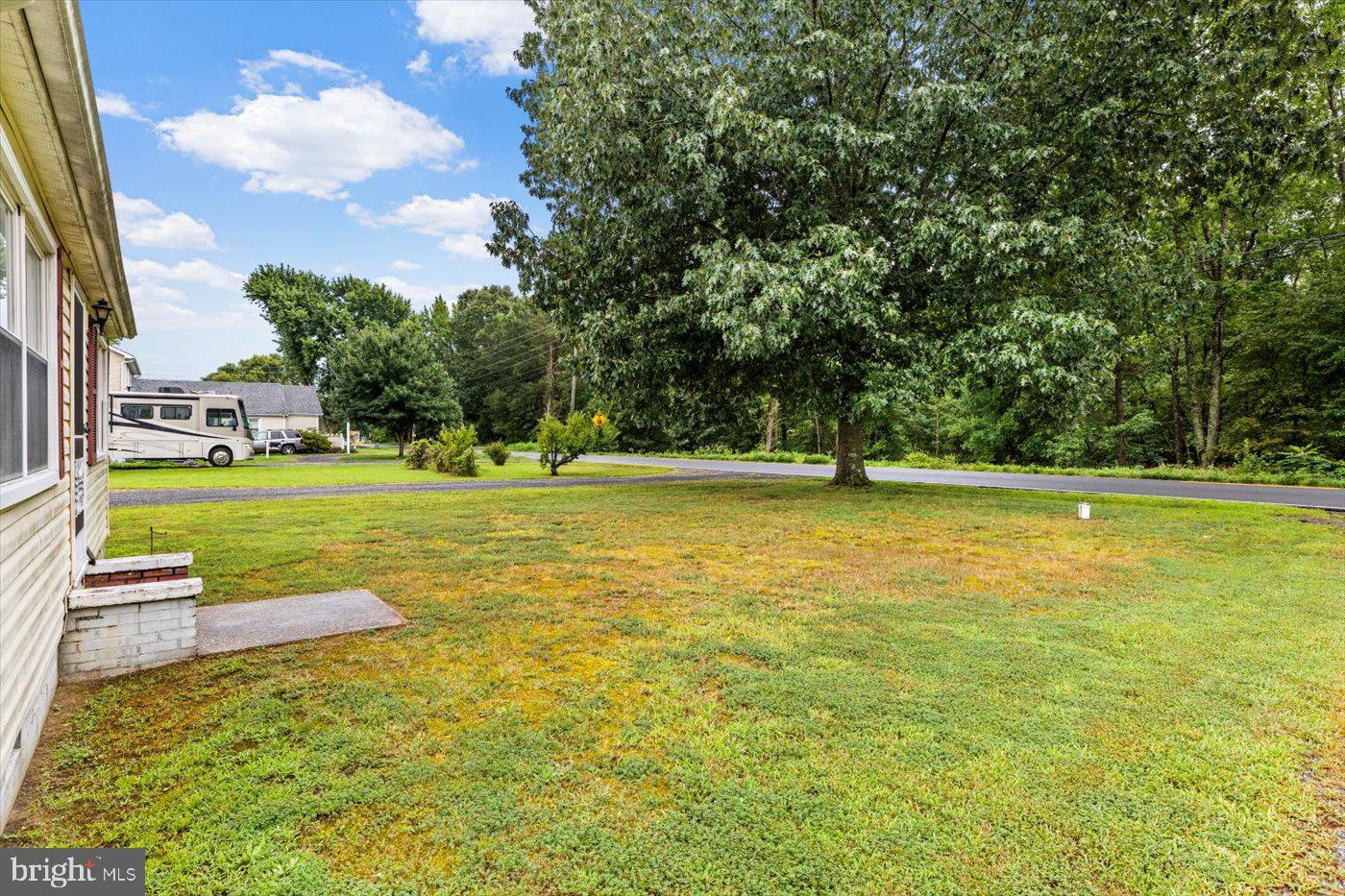 110 Longfield Road Colonial Beach, VA 22443 - Photo 8 of 40 a view of a swimming pool with a yard