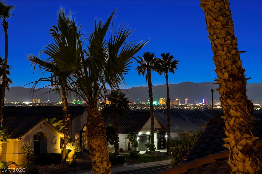 1135 Calico Ridge Drive Henderson, NV 89011 - Photo 81 of 86 Here are the views from the balcony. Breathtaking panoramic city lights illuminate the desert mountains and surrounding landscape.