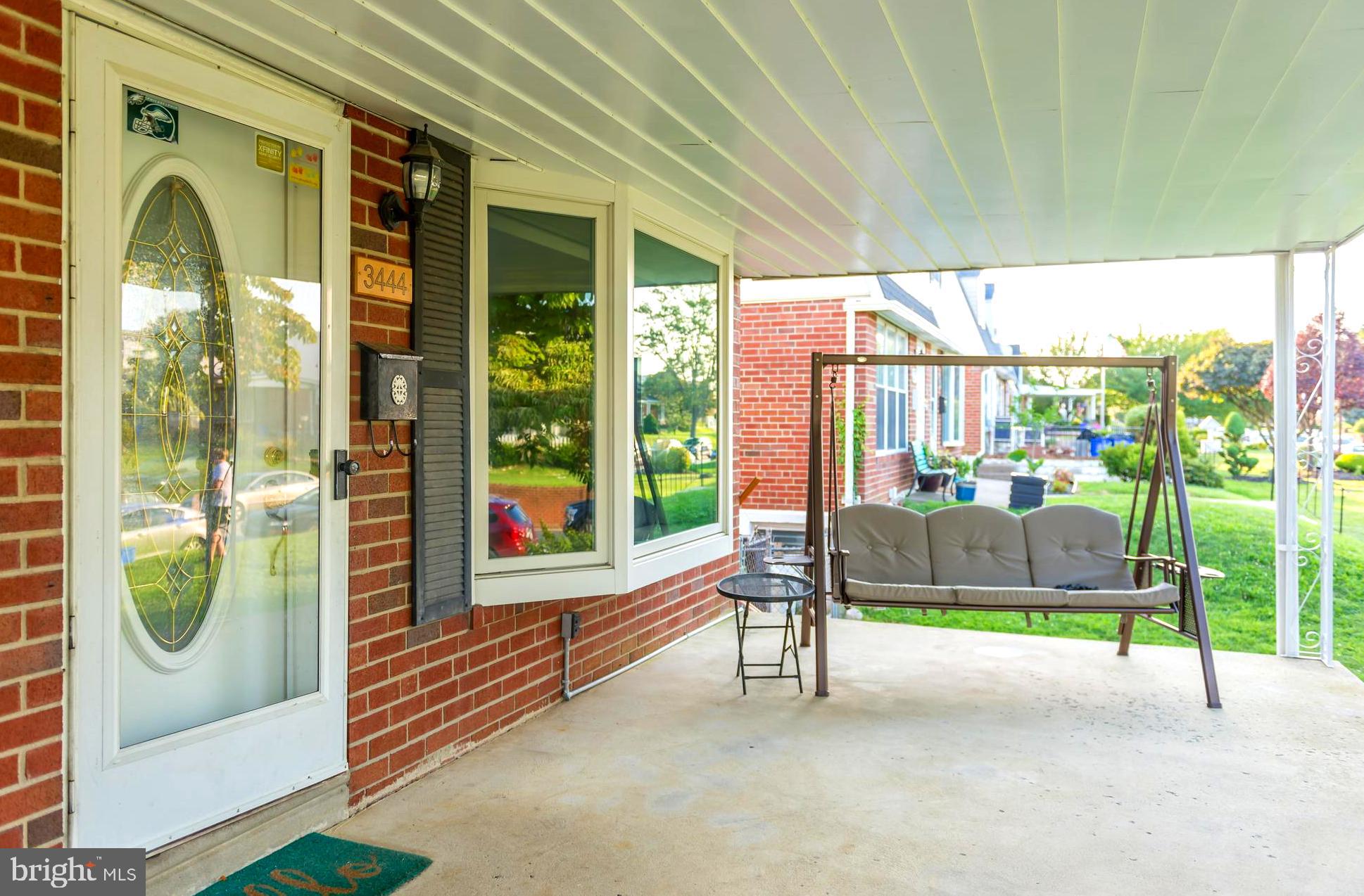 Beautiful Front Porch that welcomes you home.,