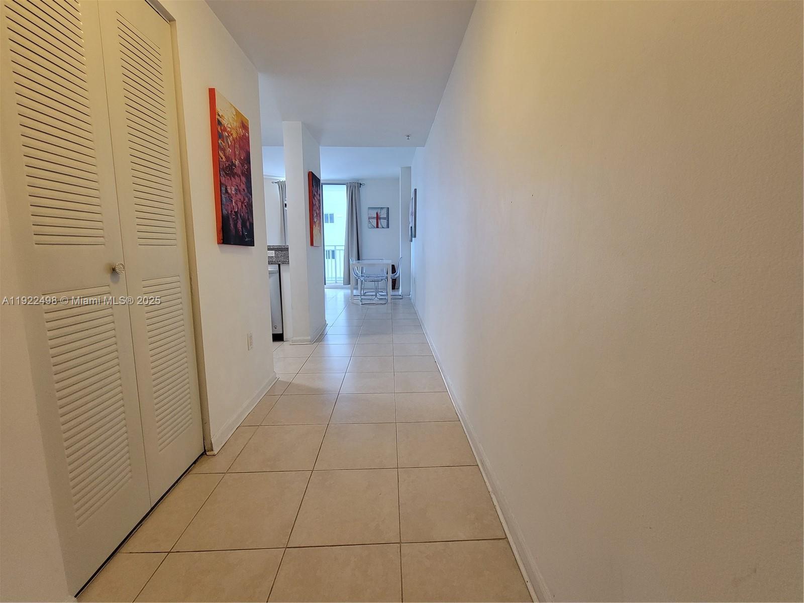 185 Southeast 14th Terrace, Unit 1101 Miami, FL 33131 - Photo 12 of 19 a view of a hallway