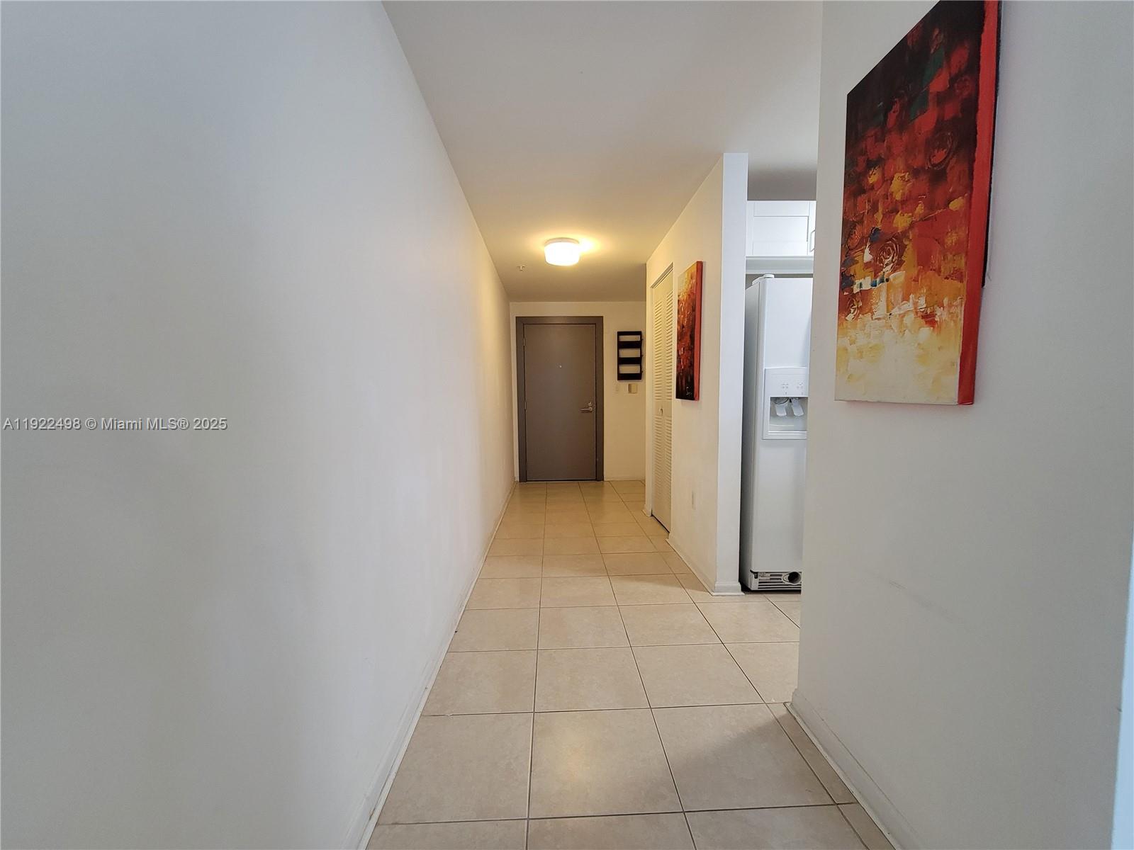 185 Southeast 14th Terrace, Unit 1101 Miami, FL 33131 - Photo 13 of 19 a view of a hallway with interior of a house