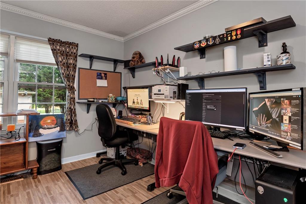 5658 Raintree Trace Oakwood, GA 30566 - Photo 23 of 55 a view of a workspace with furniture and a window