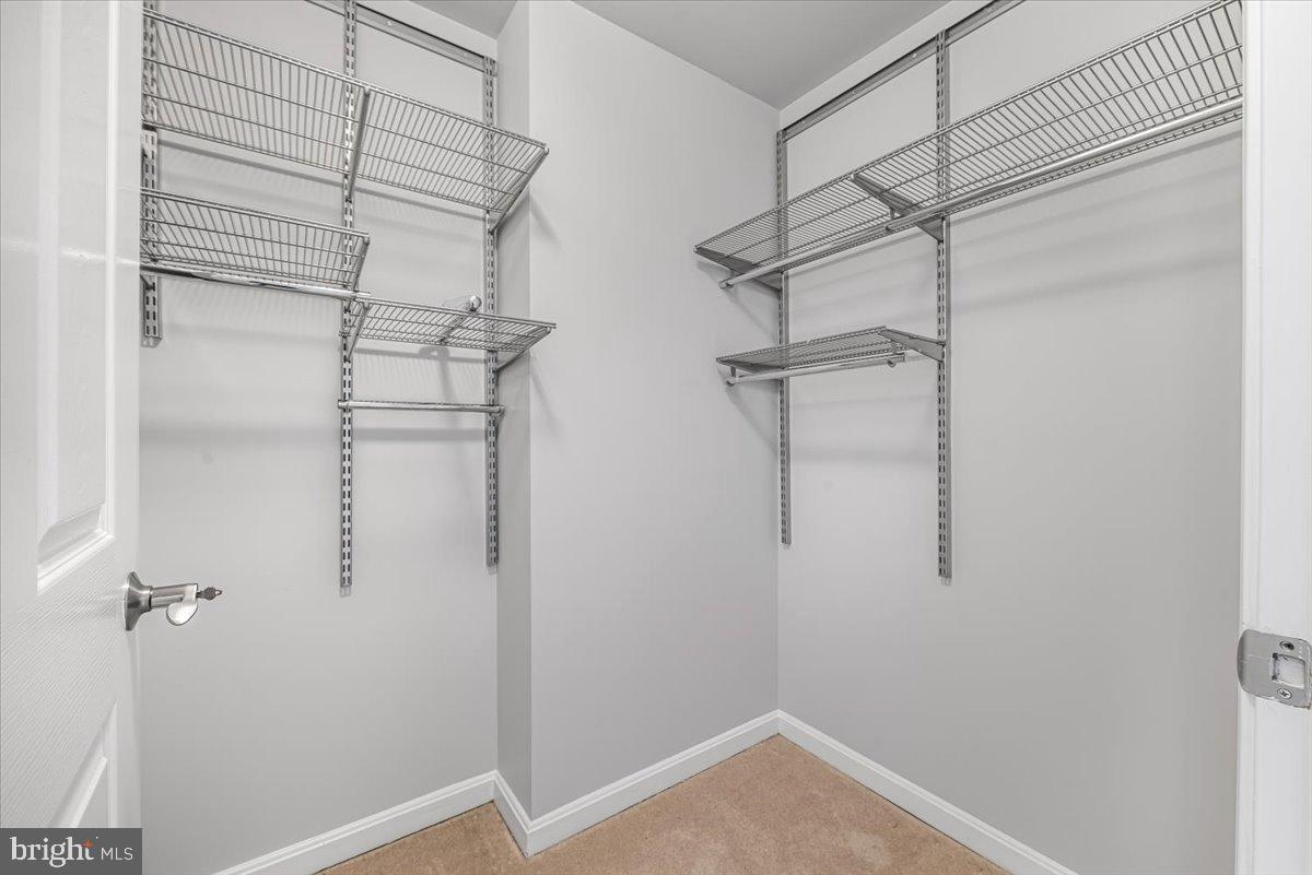 11710 Old Georgetown Road, Unit 121 North Bethesda, MD 20852 - Photo 14 of 35 a view of a room with racks on the wall