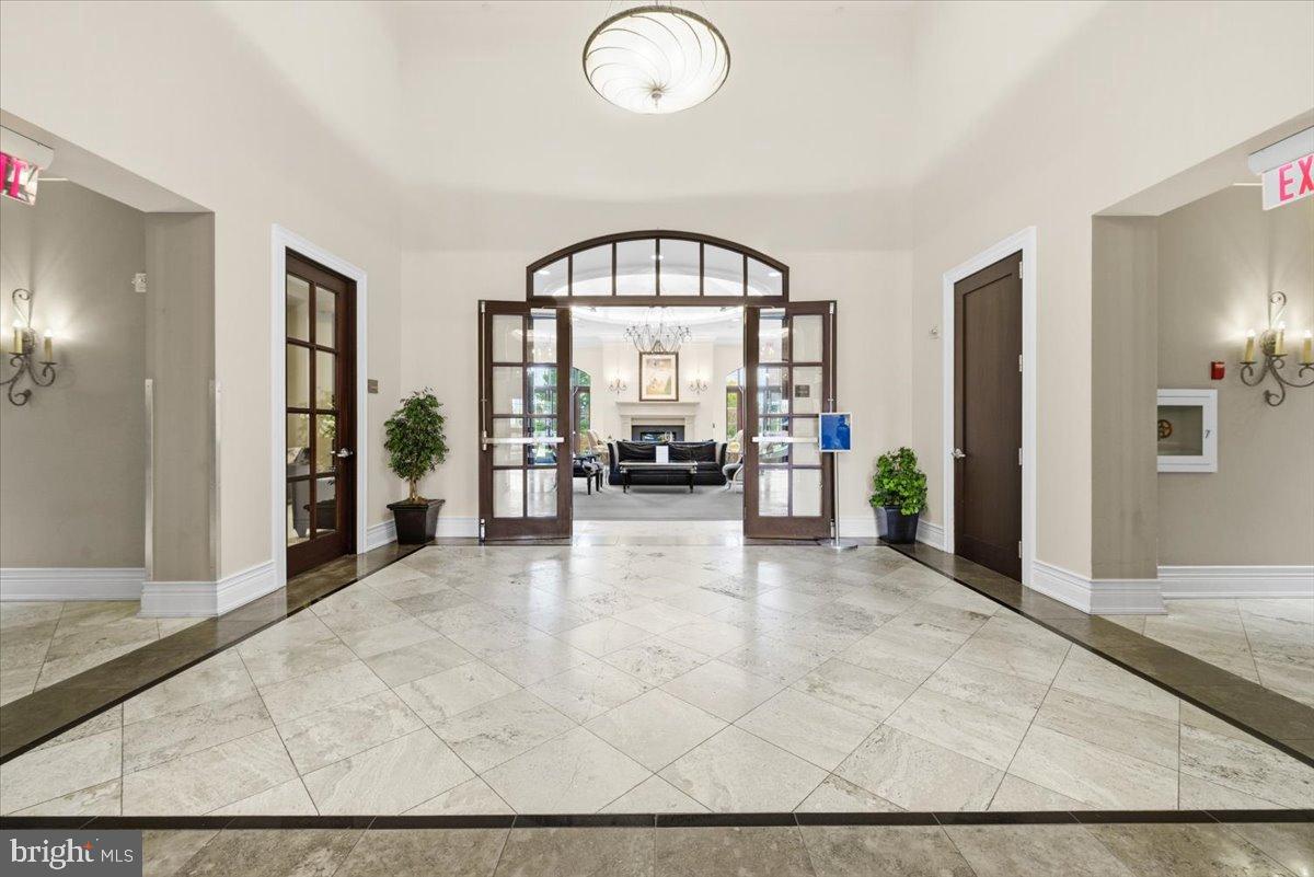 11710 Old Georgetown Road, Unit 121 North Bethesda, MD 20852 - Photo 20 of 35 a view of an entryway with wooden floor