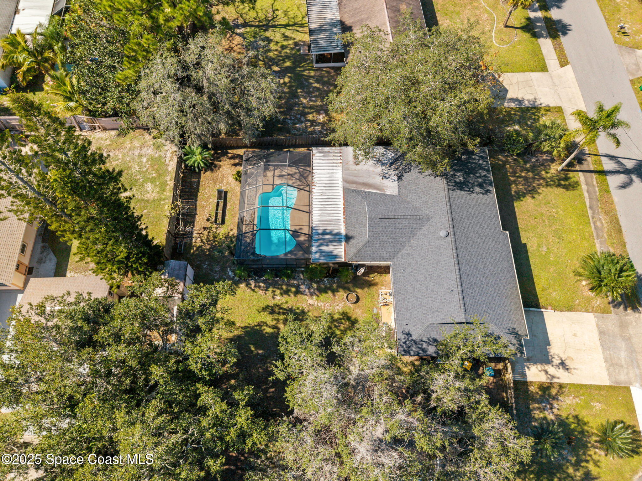 4257 Piedras Street Cocoa, FL 32927 - Photo 1 of 23 an aerial view of a house with a yard
